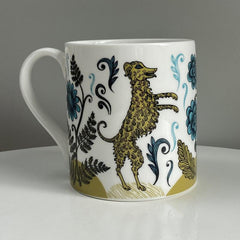 Lush Designs mug printed with a curly-coated dog on its hind-legs