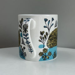 Lush designs mug with patterned handle