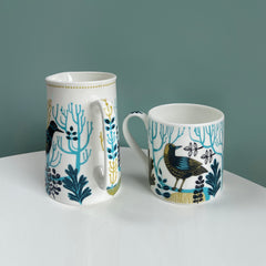 Jug and mug with bird print