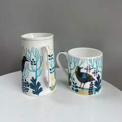 Matching bird and tree patterned bone china jug and mug